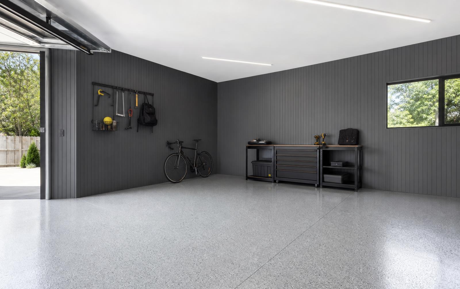 Charcoal slat wall panel system installed in a finished garage